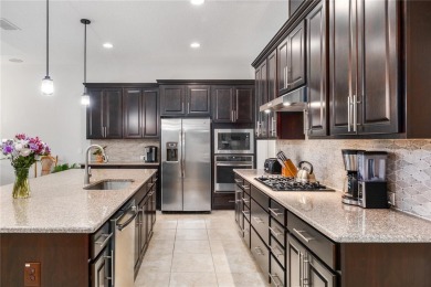 Discover tropical living without ever leaving Central Florida in on Mystic Dunes Resort and Golf Club in Florida - for sale on GolfHomes.com, golf home, golf lot
