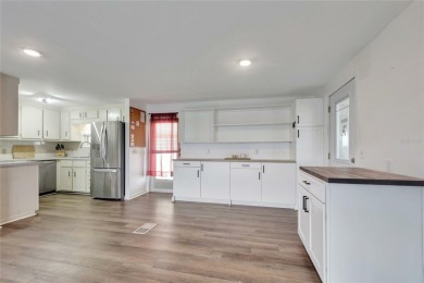 Welcome to #1052 Queensway in the Award-Winning Maple Leaf Golf on Maple Leaf Golf and Country Club in Florida - for sale on GolfHomes.com, golf home, golf lot