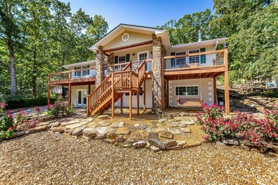 Tucked into a serene, park-like setting, this beautifully on Mountain Ranch Golf Club in Arkansas - for sale on GolfHomes.com, golf home, golf lot