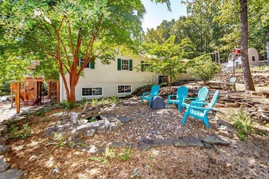 Tucked into a serene, park-like setting, this beautifully on Mountain Ranch Golf Club in Arkansas - for sale on GolfHomes.com, golf home, golf lot