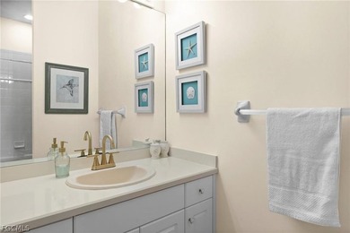 A charming front porch welcomes you to this spacious 1,782sf on Mirror Lakes Golf Club in Florida - for sale on GolfHomes.com, golf home, golf lot