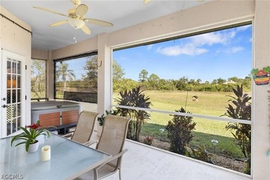 A charming front porch welcomes you to this spacious 1,782sf on Mirror Lakes Golf Club in Florida - for sale on GolfHomes.com, golf home, golf lot