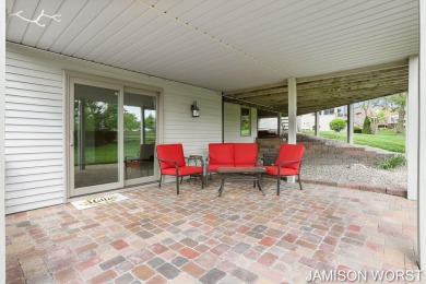 Overlooking the serene 2nd hole at the prestigious Railside Golf on Railside Golf Club in Michigan - for sale on GolfHomes.com, golf home, golf lot