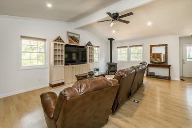 Tucked into a serene, park-like setting, this beautifully on Mountain Ranch Golf Club in Arkansas - for sale on GolfHomes.com, golf home, golf lot