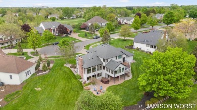 Overlooking the serene 2nd hole at the prestigious Railside Golf on Railside Golf Club in Michigan - for sale on GolfHomes.com, golf home, golf lot