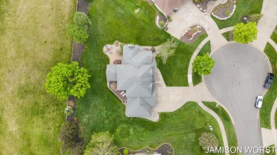 Overlooking the serene 2nd hole at the prestigious Railside Golf on Railside Golf Club in Michigan - for sale on GolfHomes.com, golf home, golf lot