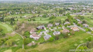 Overlooking the serene 2nd hole at the prestigious Railside Golf on Railside Golf Club in Michigan - for sale on GolfHomes.com, golf home, golf lot