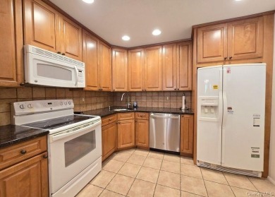 Well-maintained Malibu model corner unit located in the on Bretton Woods Country Club in New York - for sale on GolfHomes.com, golf home, golf lot