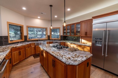 Nestled on a quiet cul-de-sac along the 18th fairway, this on Awbrey Glen Golf Club in Oregon - for sale on GolfHomes.com, golf home, golf lot