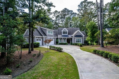 Nestled in the prestigious Harbor Club community on Lake Oconee on Harbor Club Golf and Country Club in Georgia - for sale on GolfHomes.com, golf home, golf lot