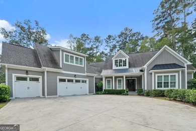 Nestled in the prestigious Harbor Club community on Lake Oconee on Harbor Club Golf and Country Club in Georgia - for sale on GolfHomes.com, golf home, golf lot