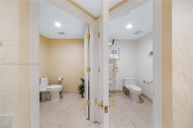Experience luxury living at Hamptons South in the heart of on Turnberry Isle Resort and Club in Florida - for sale on GolfHomes.com, golf home, golf lot