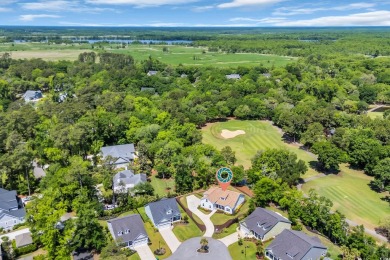 Step into timeless Southern elegance at 25 Northwoods Ct, a on Willbrook Plantation Golf Club in South Carolina - for sale on GolfHomes.com, golf home, golf lot