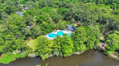 Step into timeless Southern elegance at 25 Northwoods Ct, a on Willbrook Plantation Golf Club in South Carolina - for sale on GolfHomes.com, golf home, golf lot