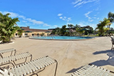 Located in an established neighborhood, this home eludes warmth on Falcon Watch Golf Club in Florida - for sale on GolfHomes.com, golf home, golf lot
