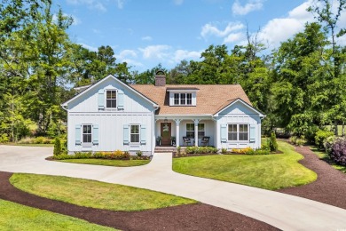 Step into timeless Southern elegance at 25 Northwoods Ct, a on Willbrook Plantation Golf Club in South Carolina - for sale on GolfHomes.com, golf home, golf lot