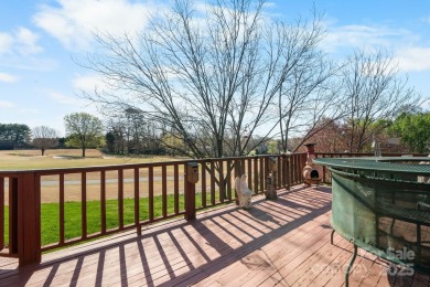Golfer's Paradise: Perched on the scenic 18th hole of the on Rock Barn Golf and Spa in North Carolina - for sale on GolfHomes.com, golf home, golf lot