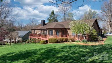 Golfer's Paradise: Perched on the scenic 18th hole of the on Rock Barn Golf and Spa in North Carolina - for sale on GolfHomes.com, golf home, golf lot
