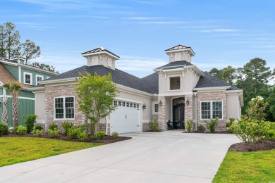 As you enter through the beautiful double wrought iron doors on Wild Wing Plantation in South Carolina - for sale on GolfHomes.com, golf home, golf lot