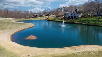 Golfer's Paradise: Perched on the scenic 18th hole of the on Rock Barn Golf and Spa in North Carolina - for sale on GolfHomes.com, golf home, golf lot