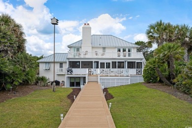 Welcome to 109 Pioneer Loop - a luxurious and sophisticated on DeBordieu Country Club in South Carolina - for sale on GolfHomes.com, golf home, golf lot