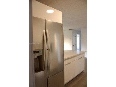 HOT PROPERTY ALERT: Beautifully updated single-family home on Sunrise Lakes Phase III in Florida - for sale on GolfHomes.com, golf home, golf lot