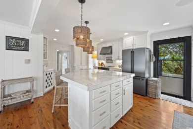 Welcome to 109 Pioneer Loop - a luxurious and sophisticated on DeBordieu Country Club in South Carolina - for sale on GolfHomes.com, golf home, golf lot