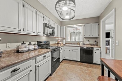 WELCOME TO YOUR MAINTENANCE PROVIDED TOWNHOME at Mission on Minor Park Golf Course in Missouri - for sale on GolfHomes.com, golf home, golf lot