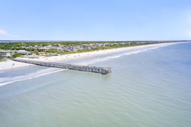 This beautiful island home is mere steps from  the beach access on Wild Dunes Harbor Golf Resort in South Carolina - for sale on GolfHomes.com, golf home, golf lot