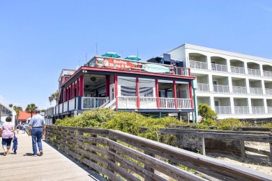 This beautiful island home is mere steps from  the beach access on Wild Dunes Harbor Golf Resort in South Carolina - for sale on GolfHomes.com, golf home, golf lot