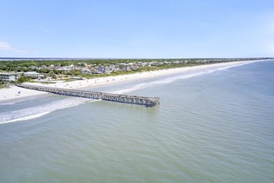 This beautiful island home is mere steps from  the beach access on Wild Dunes Harbor Golf Resort in South Carolina - for sale on GolfHomes.com, golf home, golf lot