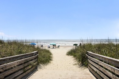 This beautiful island home is mere steps from  the beach access on Wild Dunes Harbor Golf Resort in South Carolina - for sale on GolfHomes.com, golf home, golf lot