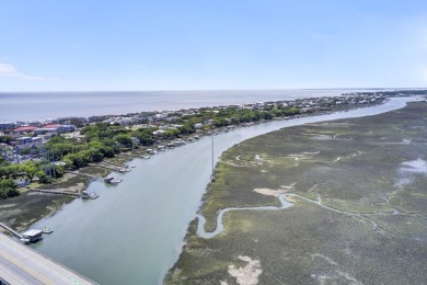 This beautiful island home is mere steps from  the beach access on Wild Dunes Harbor Golf Resort in South Carolina - for sale on GolfHomes.com, golf home, golf lot