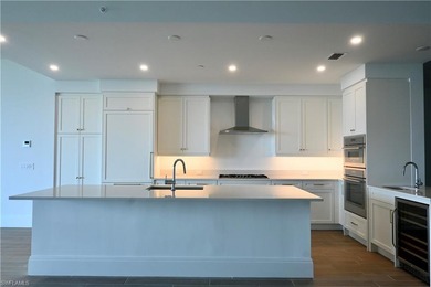 Ideally positioned on the 8th floor, this residence captures on The Colony Golf and Country Club in Florida - for sale on GolfHomes.com, golf home, golf lot