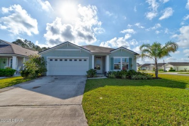 Discover this stunning lake-view home on a spacious corner lot! on Grand Reserve Golf Course in Florida - for sale on GolfHomes.com, golf home, golf lot