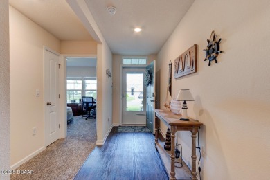 Discover this stunning lake-view home on a spacious corner lot! on Grand Reserve Golf Course in Florida - for sale on GolfHomes.com, golf home, golf lot