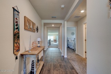 Discover this stunning lake-view home on a spacious corner lot! on Grand Reserve Golf Course in Florida - for sale on GolfHomes.com, golf home, golf lot
