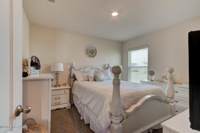 Discover this stunning lake-view home on a spacious corner lot! on Grand Reserve Golf Course in Florida - for sale on GolfHomes.com, golf home, golf lot