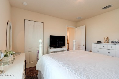 Discover this stunning lake-view home on a spacious corner lot! on Grand Reserve Golf Course in Florida - for sale on GolfHomes.com, golf home, golf lot