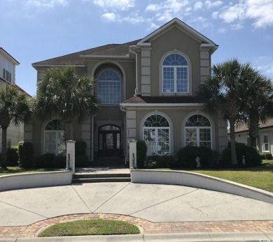 Welcome to 837 Bluffview Dr., a sprawling Mediterranean-inspired on Myrtlewood Golf Course and Club  in South Carolina - for sale on GolfHomes.com, golf home, golf lot