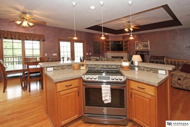 Beautiful all-brick ranch by Kinning Sydow featuring 4 bedrooms on Woodland Hills Golf Course in Nebraska - for sale on GolfHomes.com, golf home, golf lot
