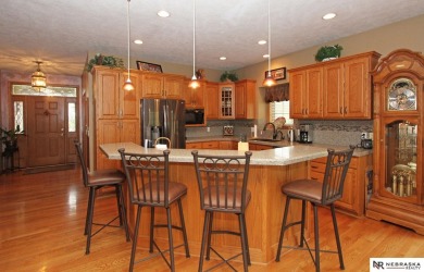 Beautiful all-brick ranch by Kinning Sydow featuring 4 bedrooms on Woodland Hills Golf Course in Nebraska - for sale on GolfHomes.com, golf home, golf lot