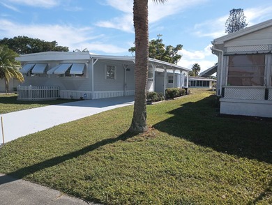 ** Waterfront Living in Spanish Lakes One - 55+ Community** on Spanish Lakes I in Florida - for sale on GolfHomes.com, golf home, golf lot