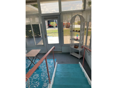 Welcome to your dream retreat! This cute Little Blue Cottage is on Blue Heron Pines Golf Course in Florida - for sale on GolfHomes.com, golf home, golf lot