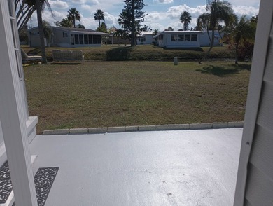 ** Waterfront Living in Spanish Lakes One - 55+ Community** on Spanish Lakes I in Florida - for sale on GolfHomes.com, golf home, golf lot