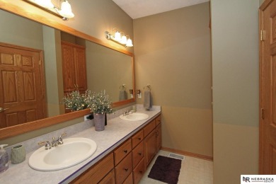 Beautiful all-brick ranch by Kinning Sydow featuring 4 bedrooms on Woodland Hills Golf Course in Nebraska - for sale on GolfHomes.com, golf home, golf lot