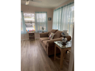 Welcome to your dream retreat! This cute Little Blue Cottage is on Blue Heron Pines Golf Course in Florida - for sale on GolfHomes.com, golf home, golf lot