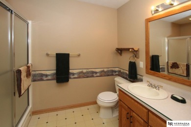 Beautiful all-brick ranch by Kinning Sydow featuring 4 bedrooms on Woodland Hills Golf Course in Nebraska - for sale on GolfHomes.com, golf home, golf lot