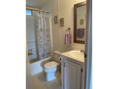 Welcome to your dream retreat! This cute Little Blue Cottage is on Blue Heron Pines Golf Course in Florida - for sale on GolfHomes.com, golf home, golf lot