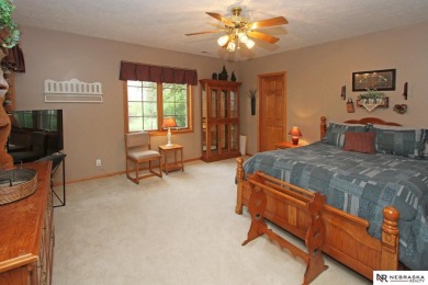 Beautiful all-brick ranch by Kinning Sydow featuring 4 bedrooms on Woodland Hills Golf Course in Nebraska - for sale on GolfHomes.com, golf home, golf lot